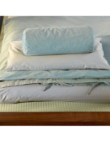 Sato futon, duvet, pillow and bolster on Sato bed Chikarà with tatami. All covers cotton jacquard chic green.