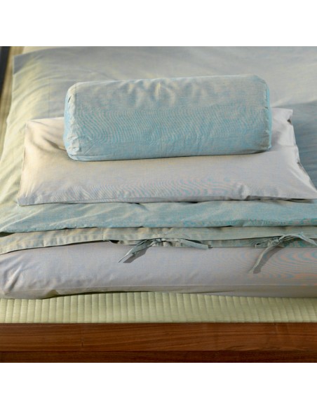Sato futon, duvet, pillow and bolster on Sato bed Chikarà with tatami. All covers cotton jacquard chic green.