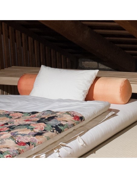 Sato sleeping pillow with covers on Sato futon.